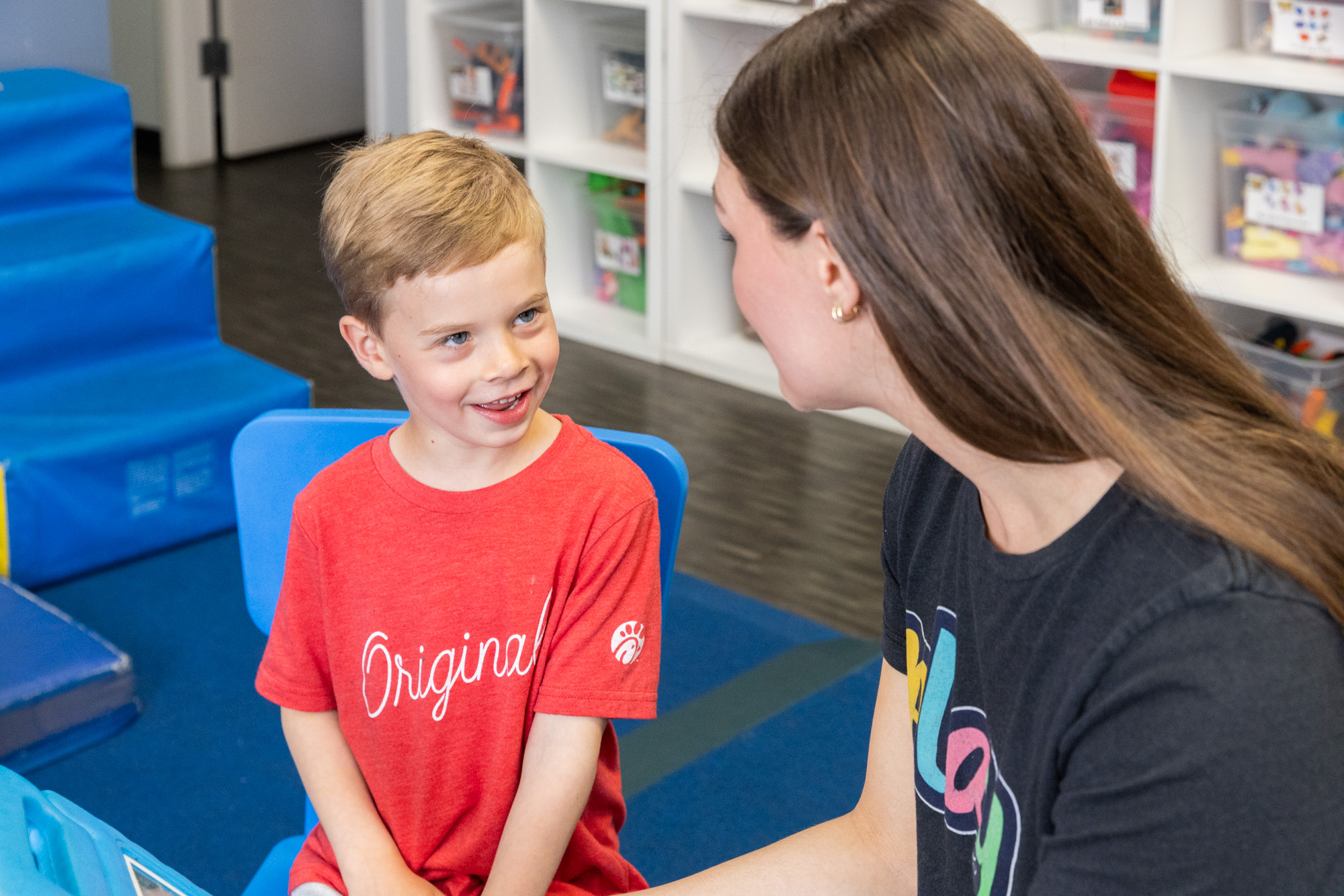 Pediatric speech client working with speech therapist on kindergarten readiness skills