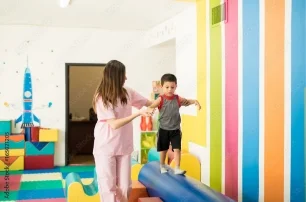 Therapist running a developmental program