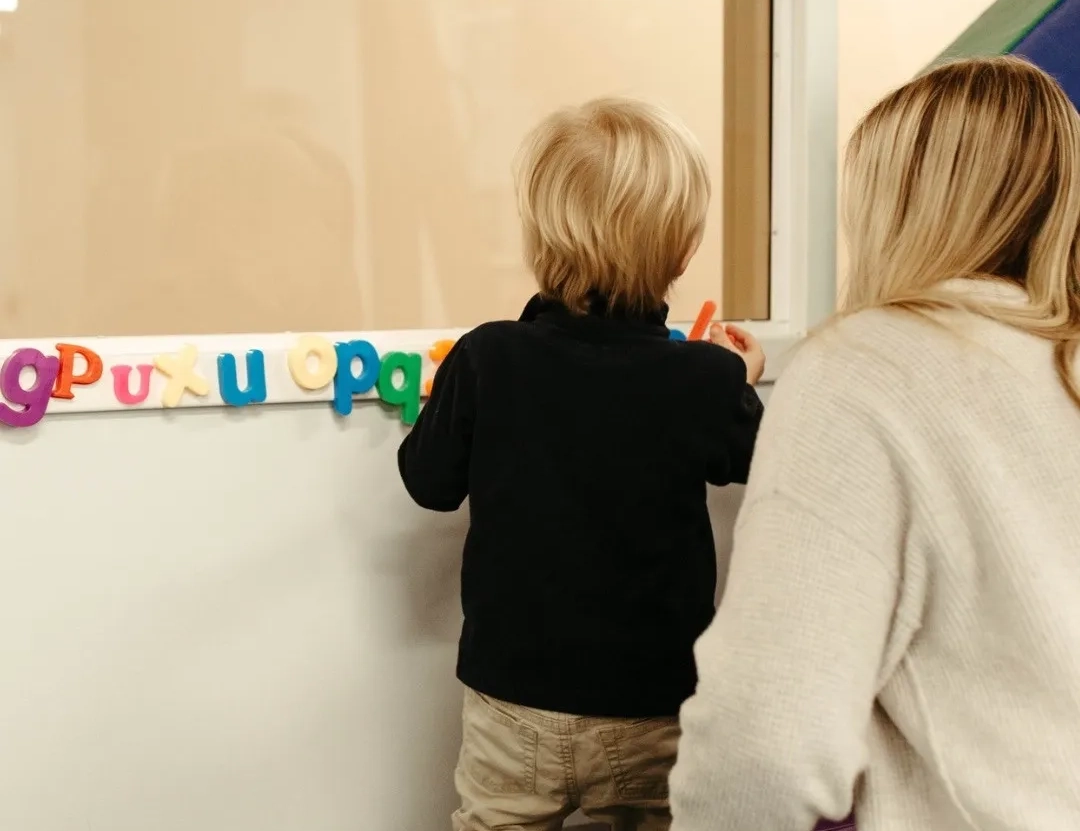 Therapist working with a young child