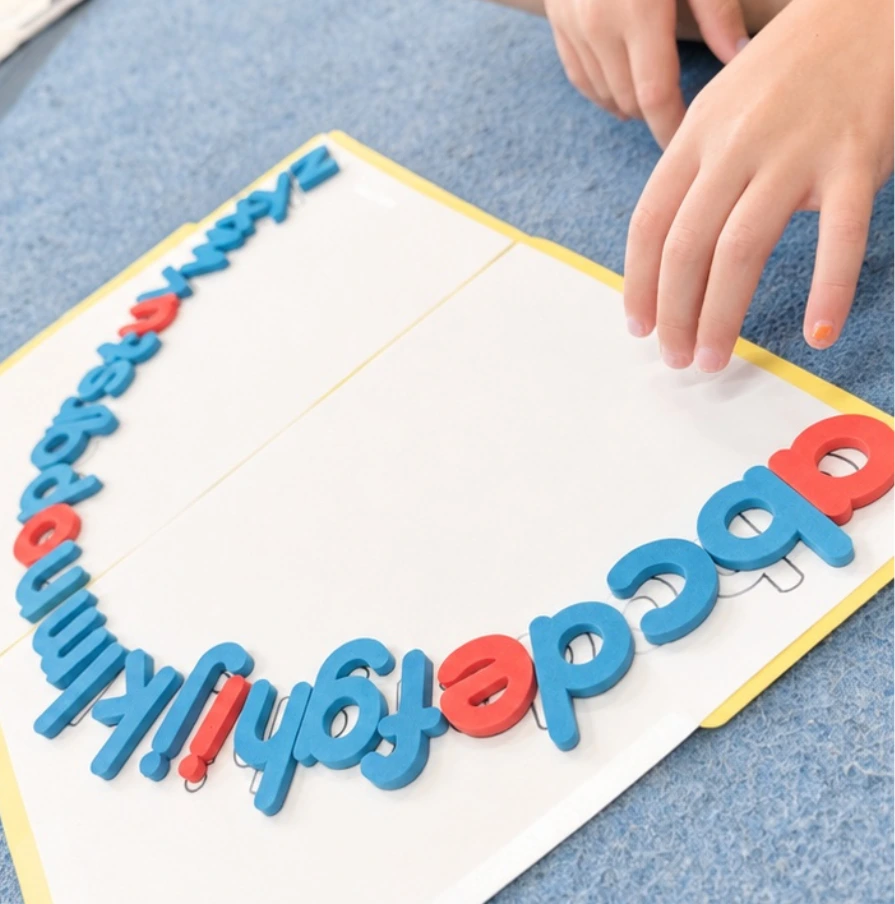 Child doing letter board activity in early literacy program