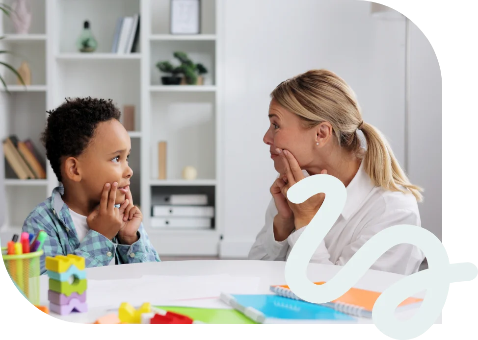 Therapist working with a young client during a session