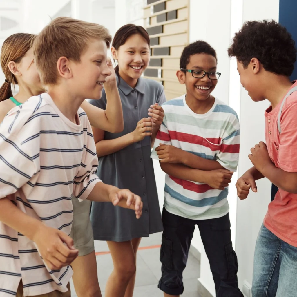Children navigating social situations in small-group program at Playabilities